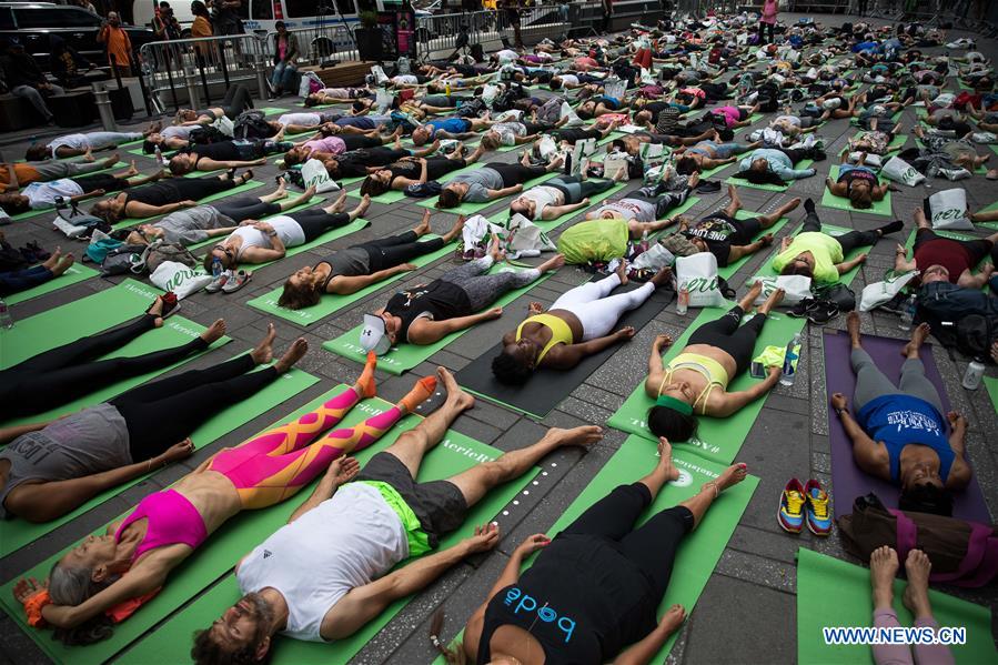 U.S.-NEW YORK-TIMES SQUARE-YOGA
