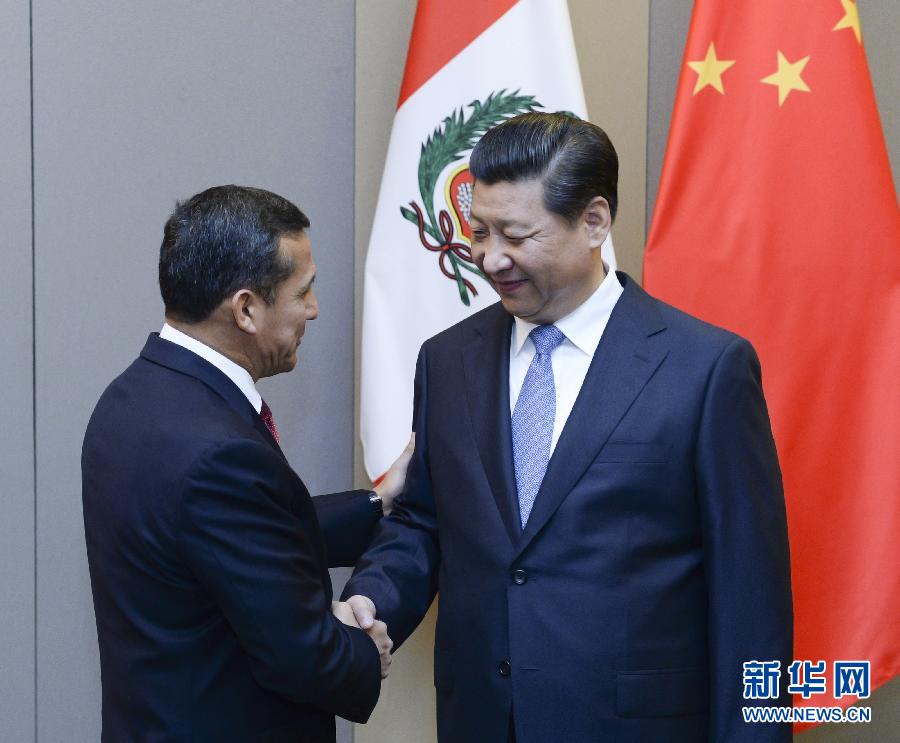 7月16日，國家主席習近平在巴西首都巴西利亞會見秘魯總統(tǒng)烏馬拉。新華社記者 劉建生 攝 