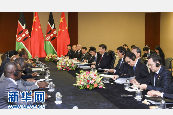 12月3日，國家主席習近平在約翰內斯堡會見肯尼亞總統肯雅塔。新華社記者 謝環馳 攝