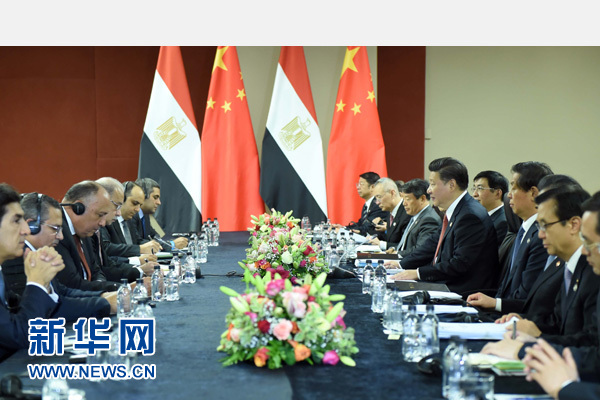 12月4日，國家主席習(xí)近平在約翰內(nèi)斯堡會見埃及總理伊斯梅爾。新華社記者 張鐸 攝 
